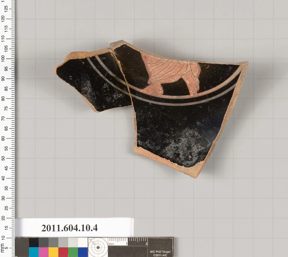 Terracotta fragment of a stemless kylix (drinking cup)? — Unknown