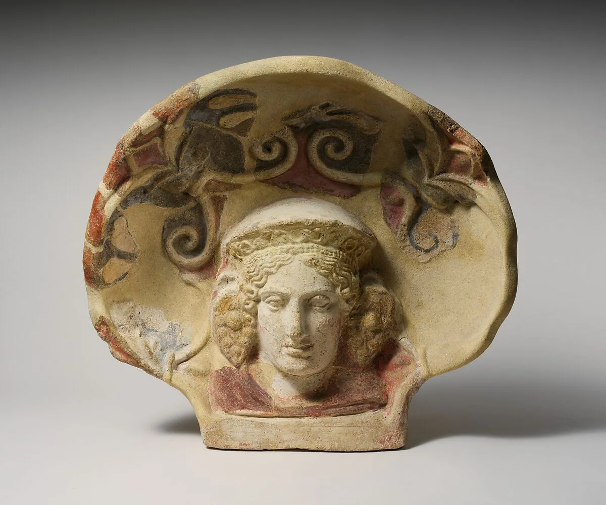 Terracotta antefix (roof tile) with head of a maenad — Unknown