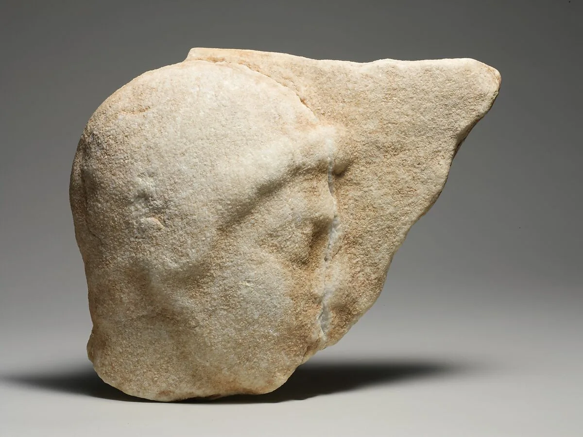 Marble relief fragment with the head of a youth — Unknown