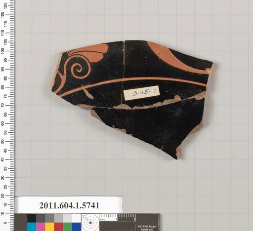 Terracotta fragment of a kylix: eye-cup (drinking cup)