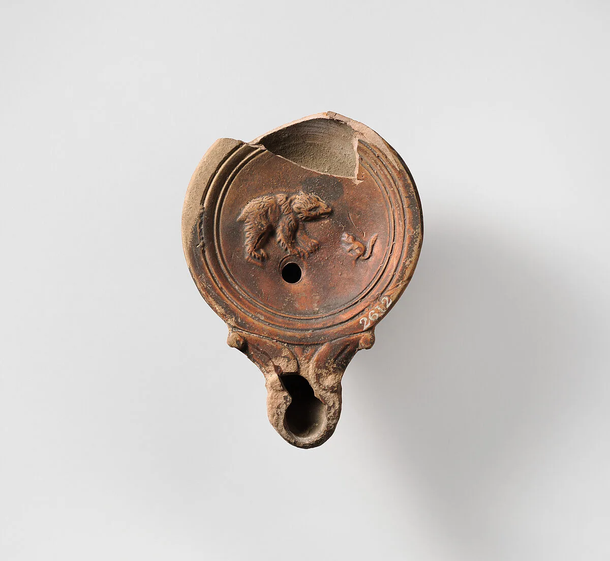 Terracotta oil lamp — Unknown