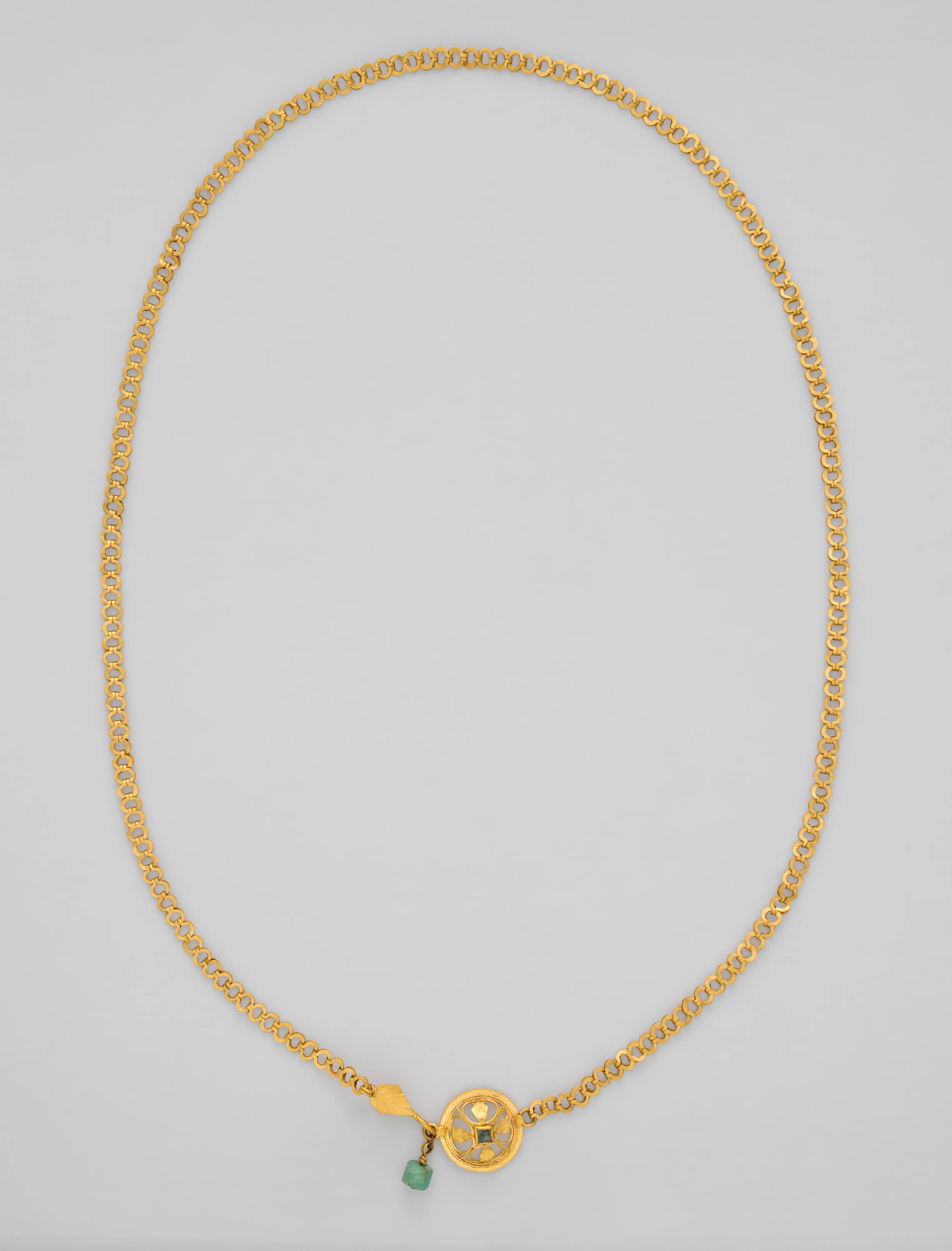 Chain terminating in a leaf motif, and having a raised openwork clasp ornament — Unknown