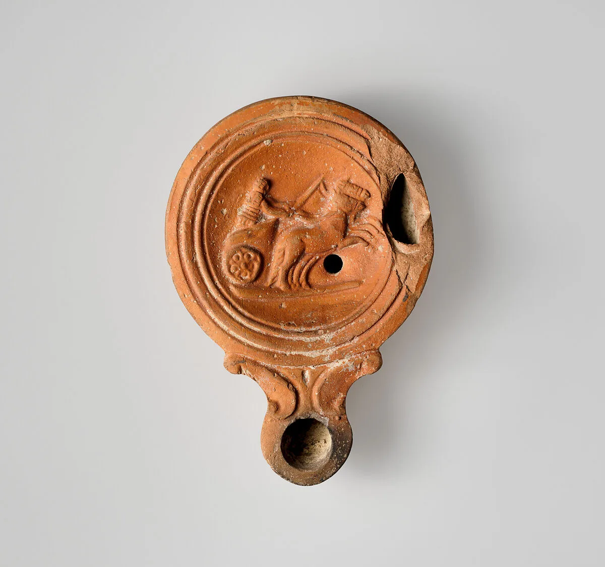 Terracotta oil lamp — Unknown