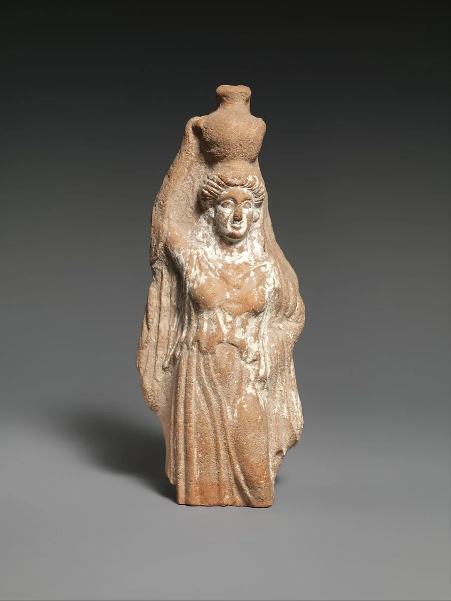 Terracotta statuette of a female votary carrying a hydria — Unknown