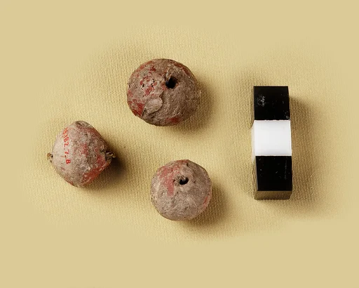 Three large spherical beads