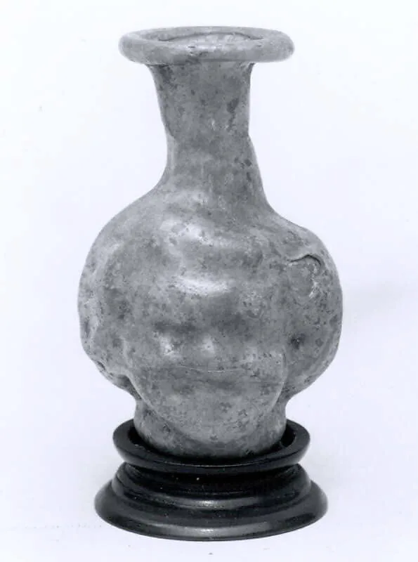 Head-shaped flask — Unknown