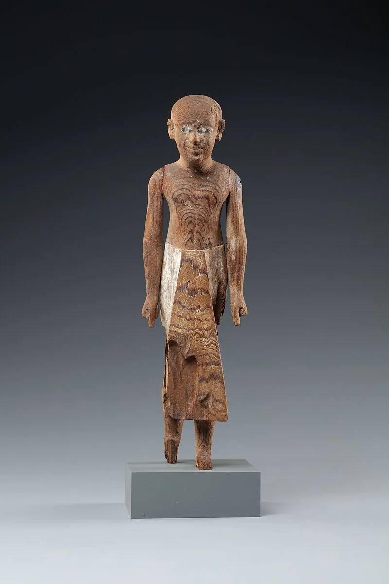 Figure of a Standing Man with a Long Kilt — Unknown