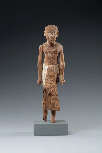 Figure of a Standing Man with a Long Kilt