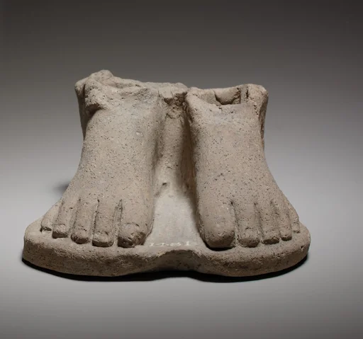 Feet on a plinth
