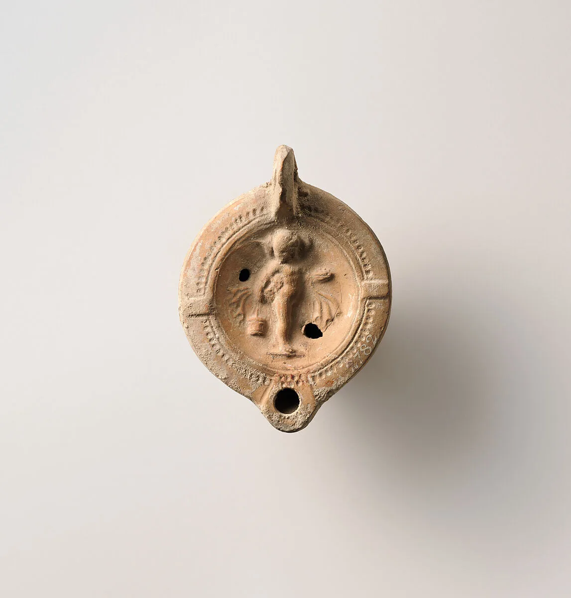 Terracotta oil lamp — Unknown