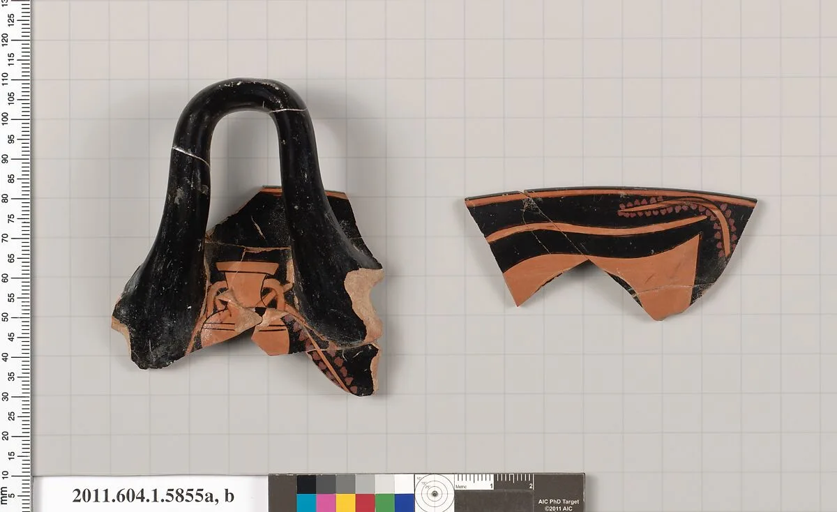 Terracotta fragments of a kylix: eye-cup (drinking cup) — Andokides Painter