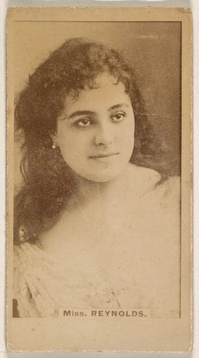 Miss Reynolds, from the Actresses series (N245) issued by Kinney Brothers to promote Sweet Caporal Cigarettes — Kinney Brothers Tobacco Company