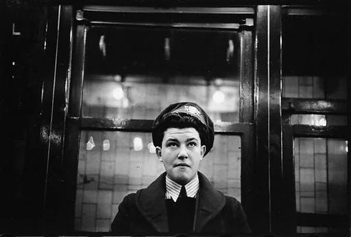 [Five 35mm Film Frames: Subway Passengers, Times Square Shuttle, New York City: Boy in Coat and Hat, Man in Hat and Scarf, Man Reading Newspaper, Two Women in Conversation]