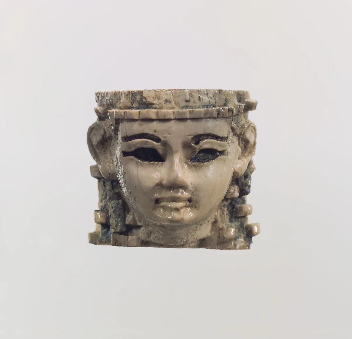 Head of a male or female figure — Unknown