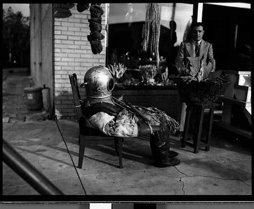 [Sponge Diver's Suit in Front of Mermaid Curio Shoppe, Florida]