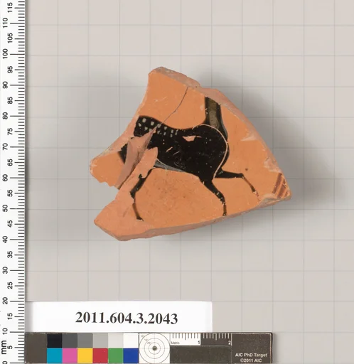 Terracotta fragment of a kylix (drinking cup)