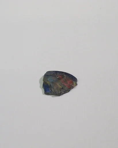 Mold-pressed amulet or fragment