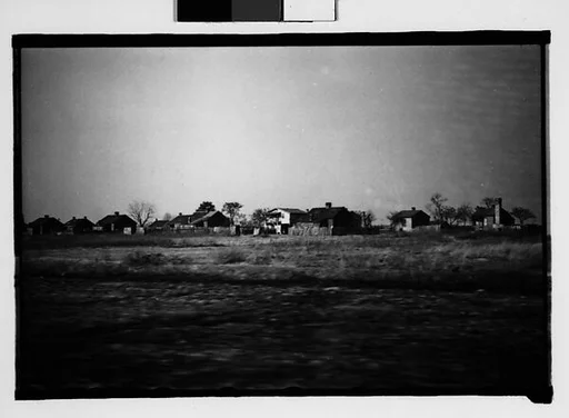 [Wooden Houses, From Moving Automobile, Savannah Vicinity, Georgia]