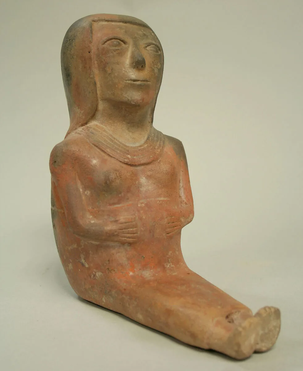 Ceramic Seated Female Figure — Unknown