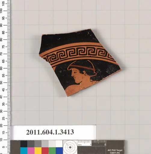 Terracotta fragment of a kylix (drinking cup)