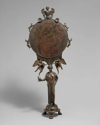 Bronze mirror with a support in the form of a draped woman