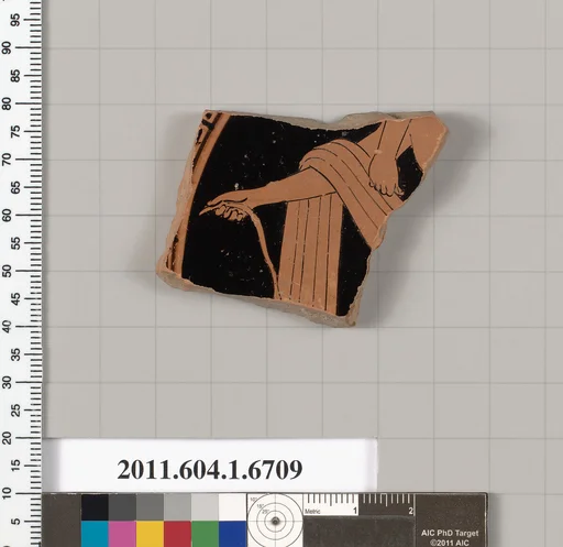 Terracotta fragment of a kylix (drinking cup)
