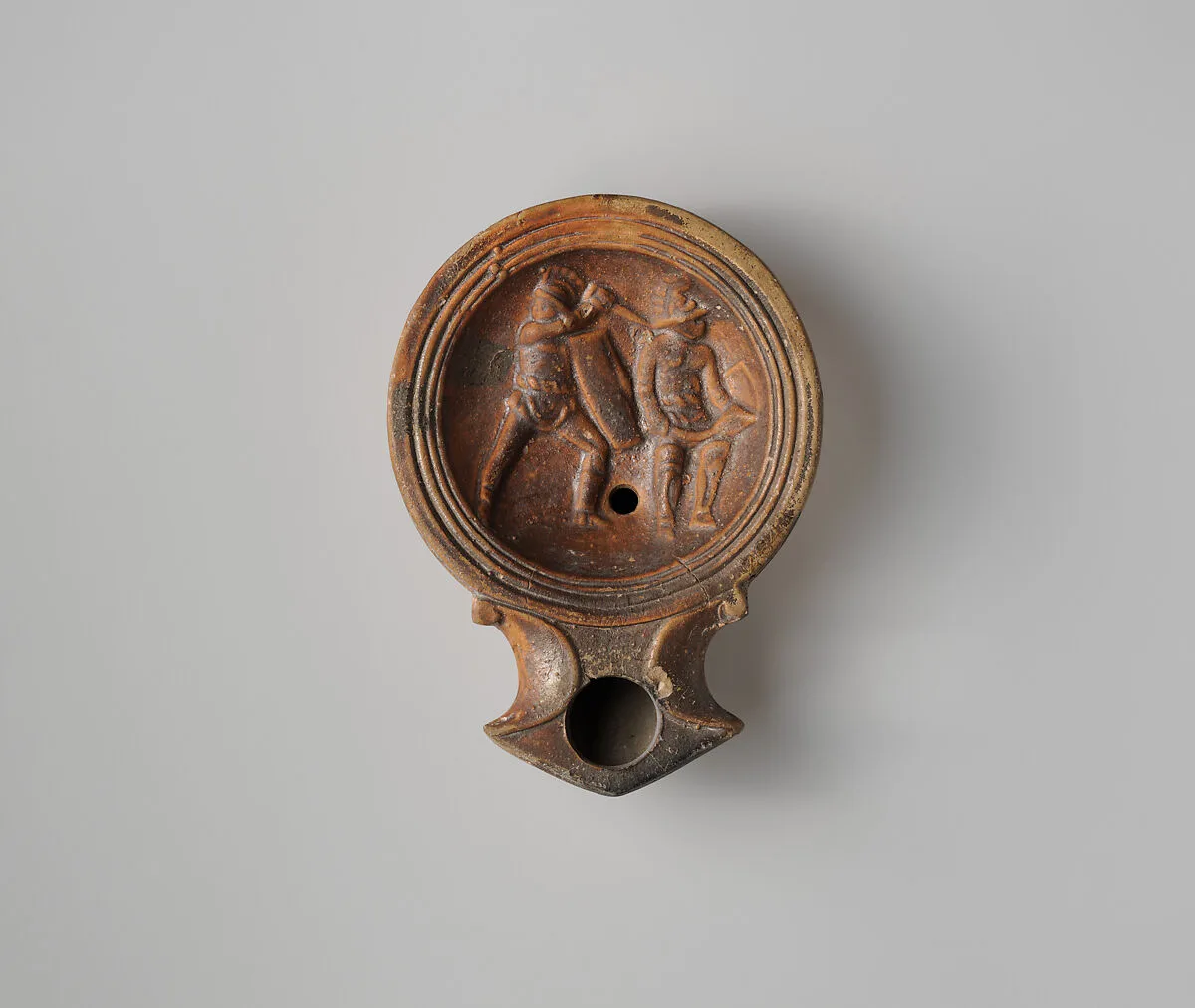 Terracotta oil lamp — Unknown