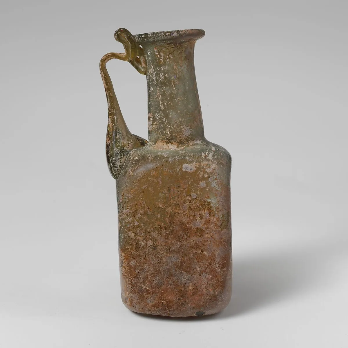 Glass square bottle — Unknown