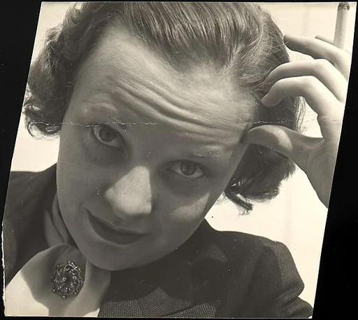 [Headshot of Unidentified Woman Holding Cigarette, Possibly Anne Harvey]
