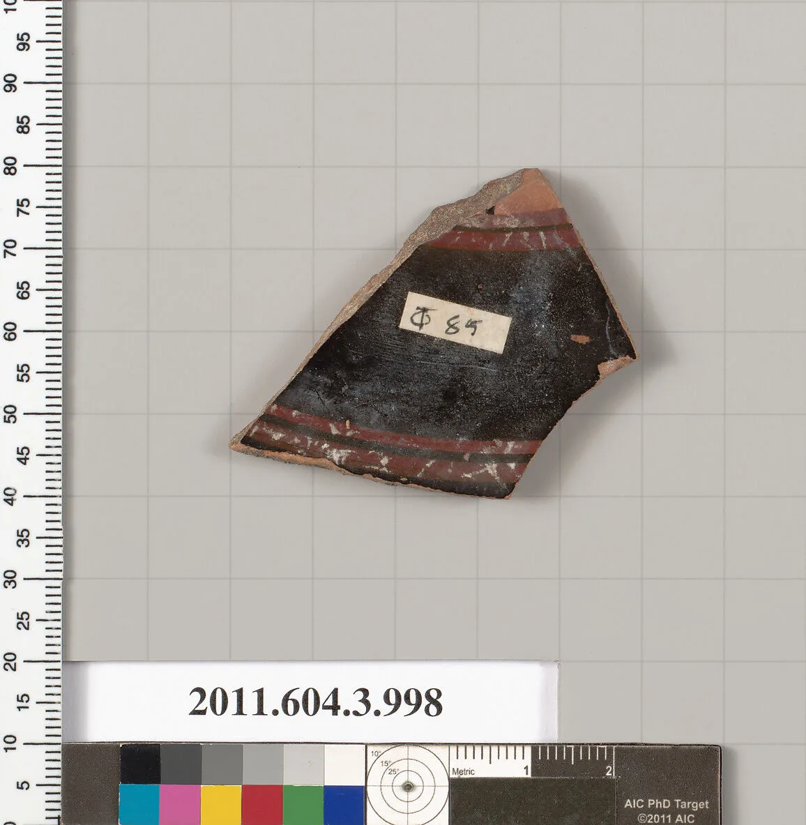 Terracotta fragment of a lekanis lid (covered dish) — Unknown