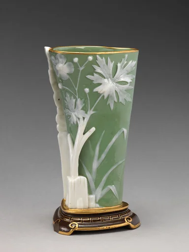 Triangular shaped vase