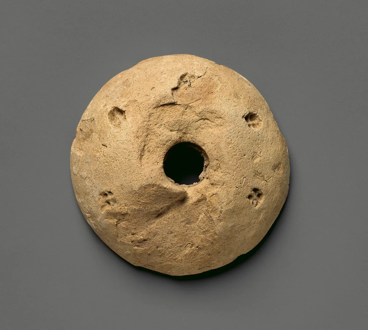 Spindle whorl — Unknown