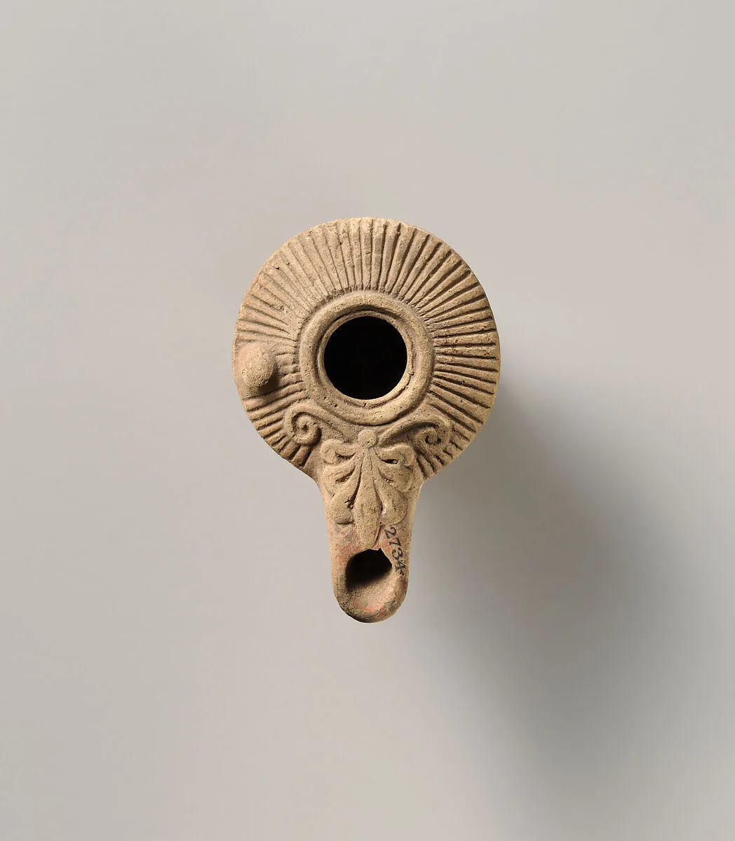 Terracotta oil lamp — Unknown