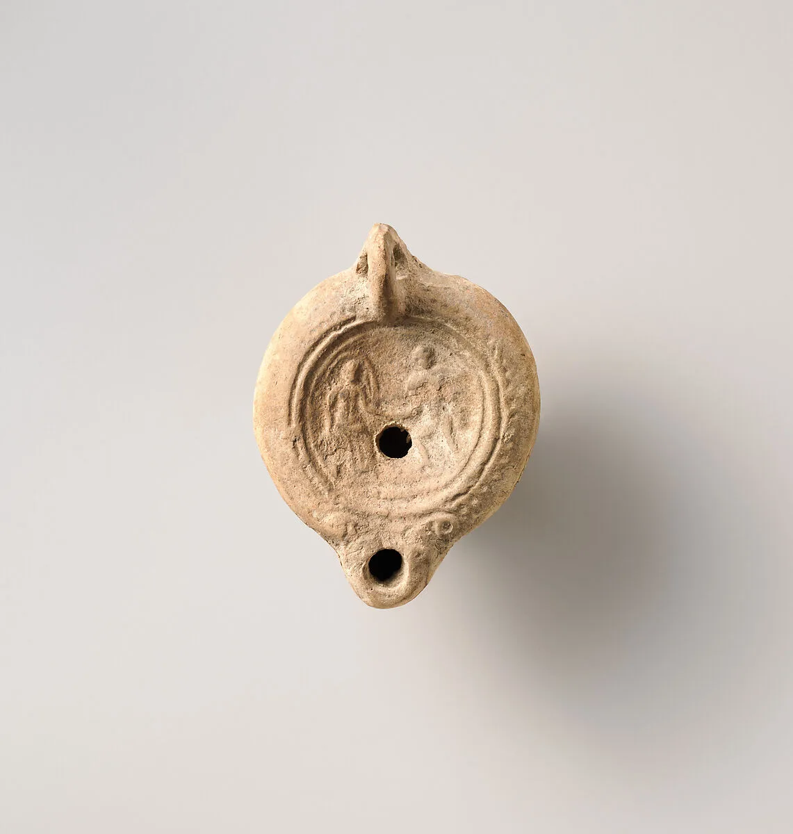 Terracotta oil lamp — Unknown