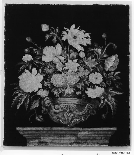 Flowers in a silver vase