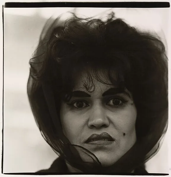 Puerto Rican woman with a beauty mark, N.Y.C. — Diane Arbus