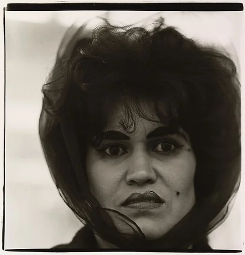 Puerto Rican woman with a beauty mark, N.Y.C.