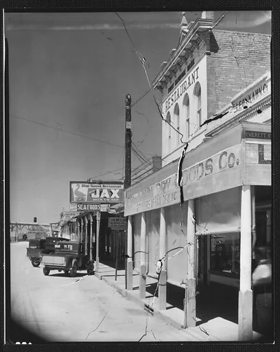 [Shopfronts and Parked Cars on Main Street, Morgan City, Louisiana]