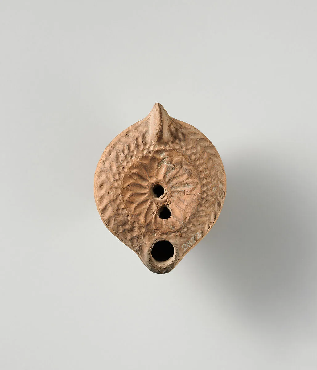 Terracotta oil lamp — Unknown