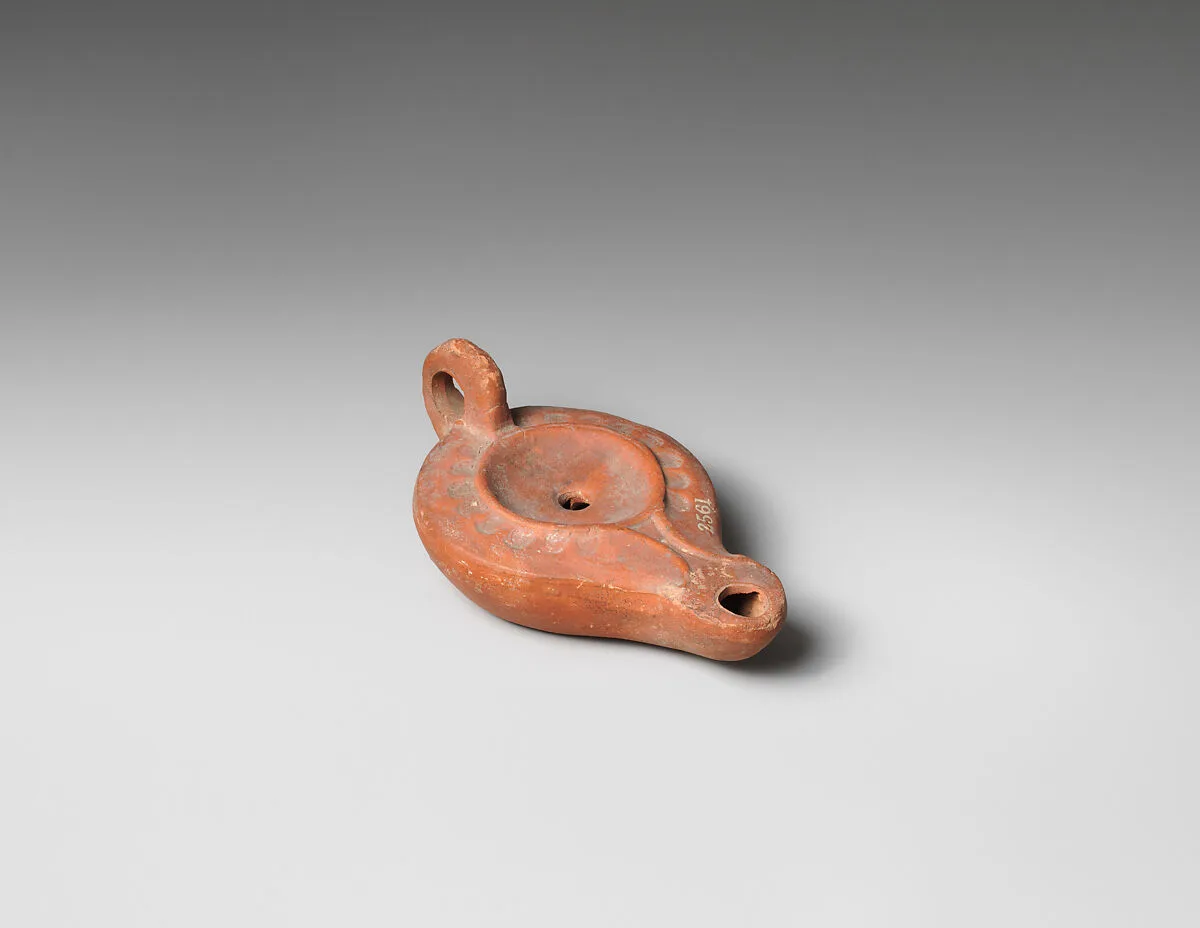 Terracotta oil lamp — Unknown