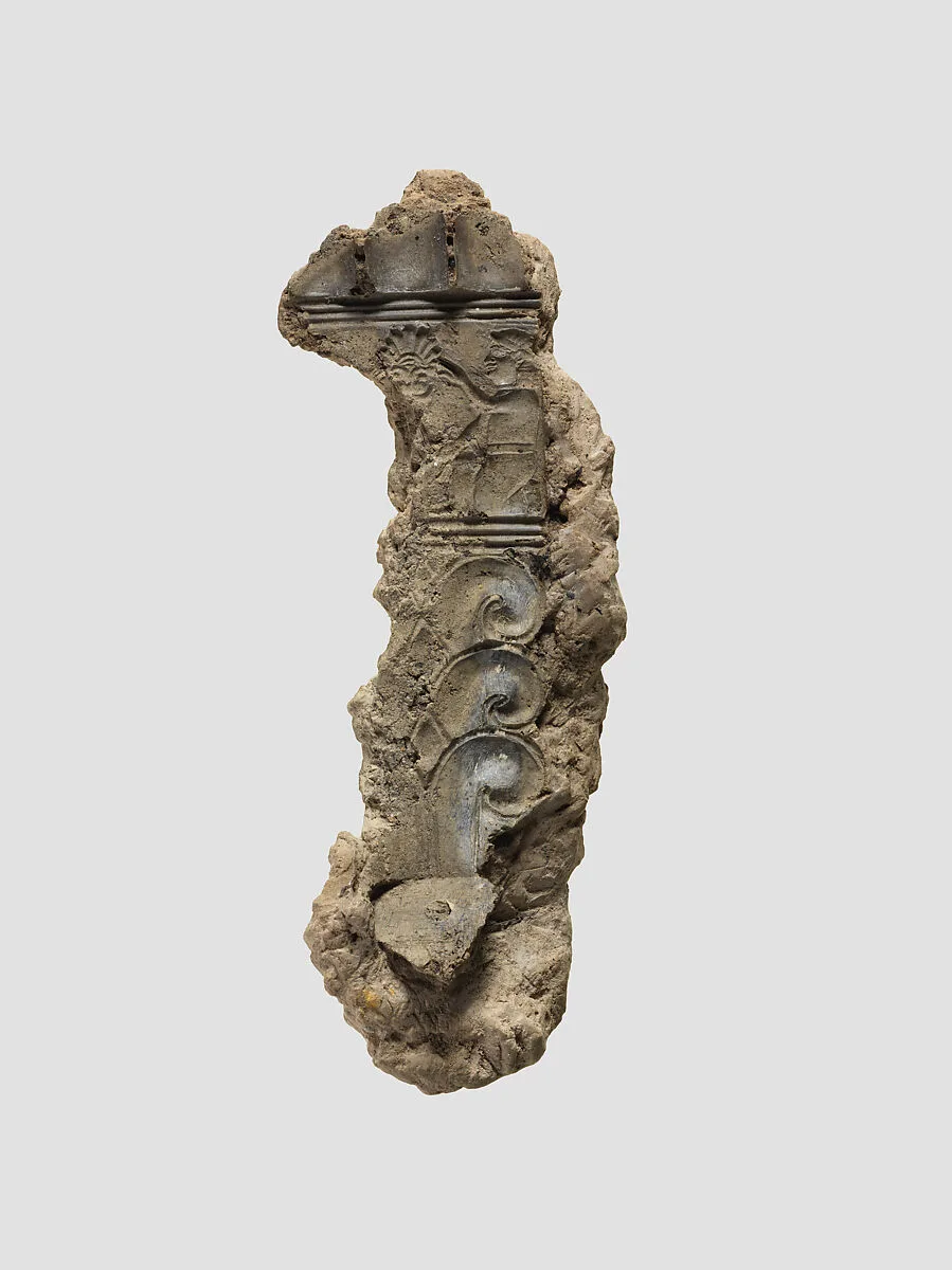 Mud impression of ivory handle 54.117.3 — Unknown