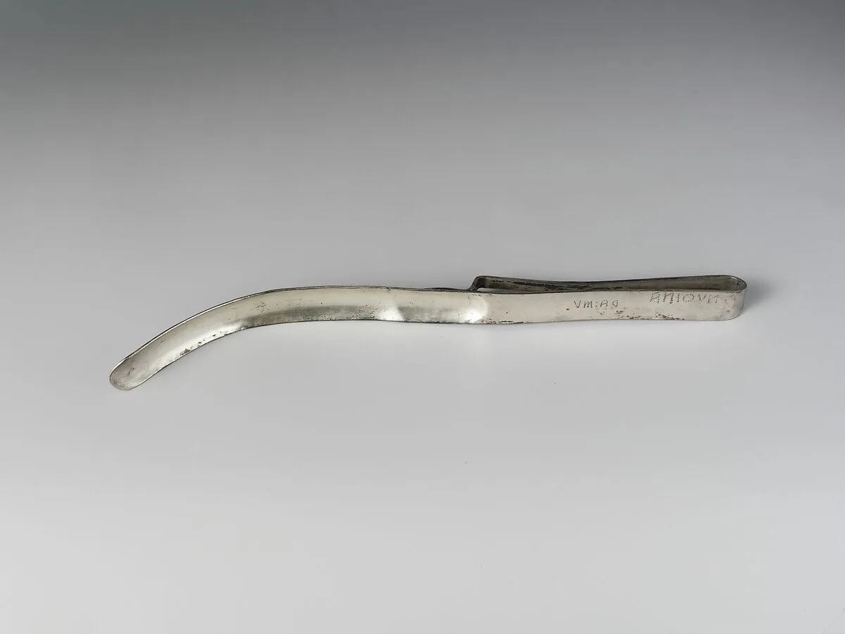 Silver strigil (scraper) — Unknown