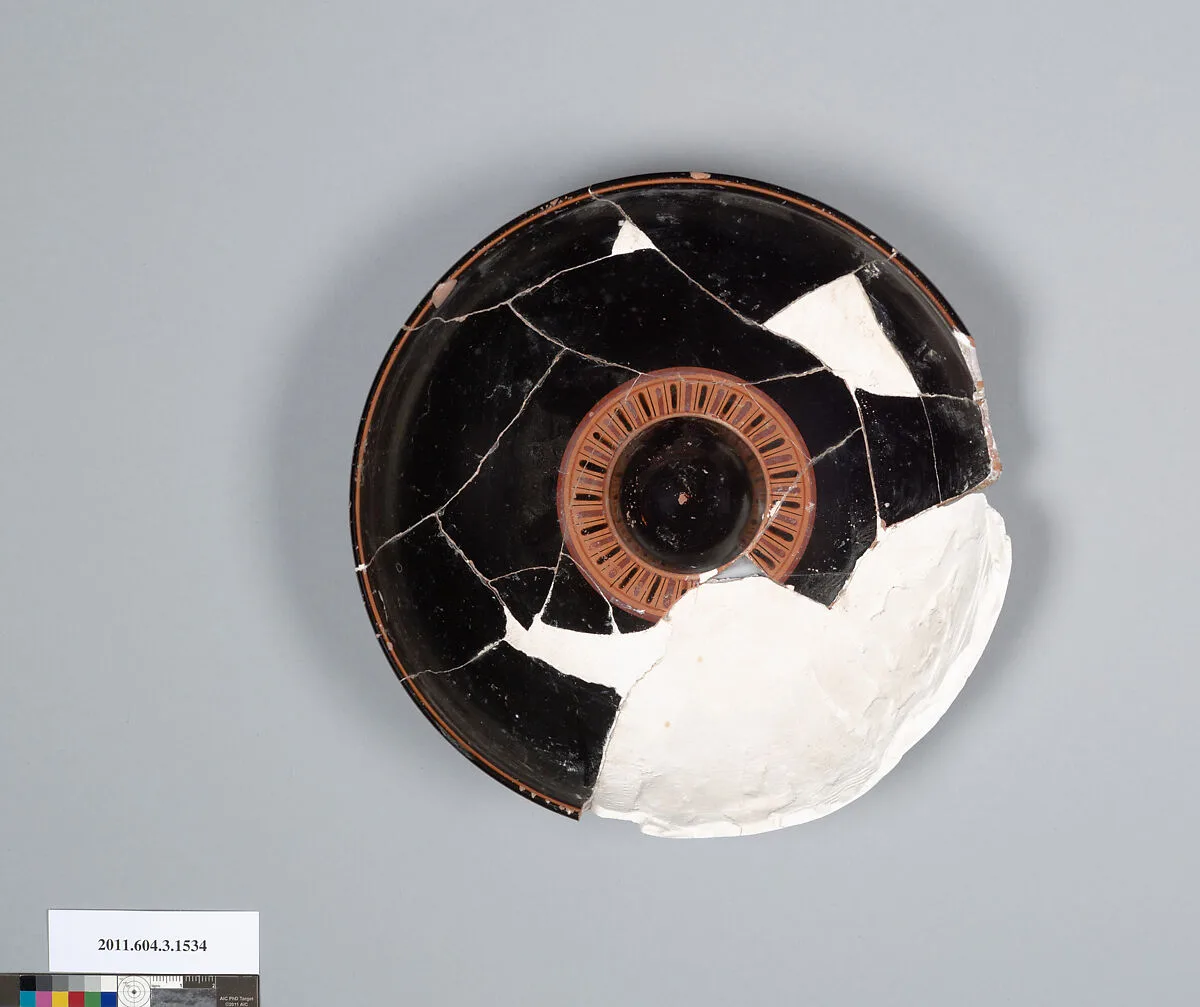 Terracotta fragment of a phiale (libation bowl) — Unknown
