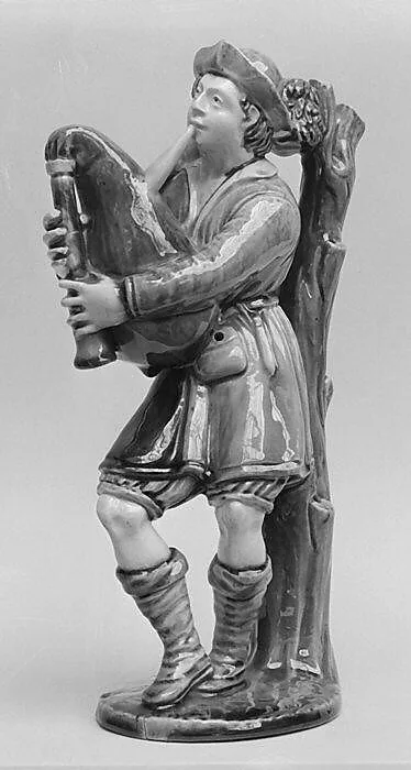 Man with bagpipes — Unknown