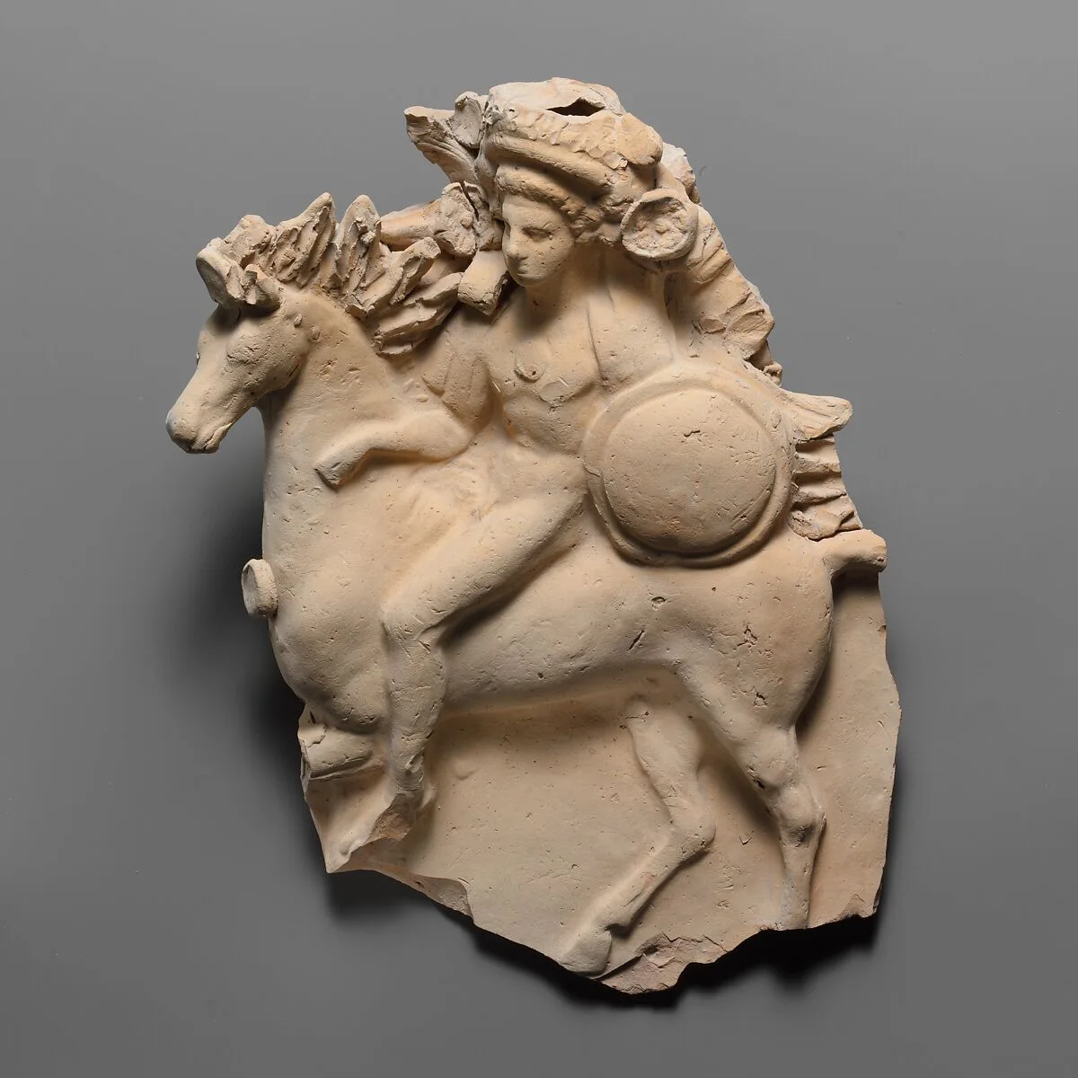 Terracotta relief of a horseman — Unknown