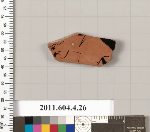 Terracotta fragment of a kylix (drinking cup)