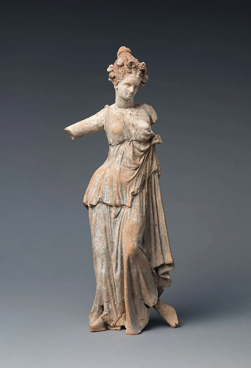 Terracotta statuette of a woman — Unknown