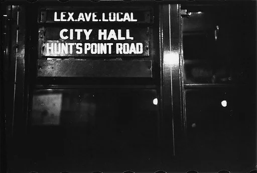 [Three 35mm Film Frames: "Lex Ave Local" Sign in Subway Car, Subway Passengers, New York City: Man, Woman]