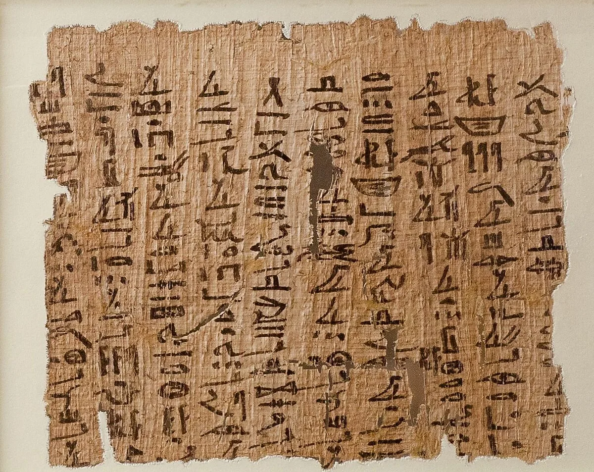 Papyrus inscribed with an account and a religious text — Unknown