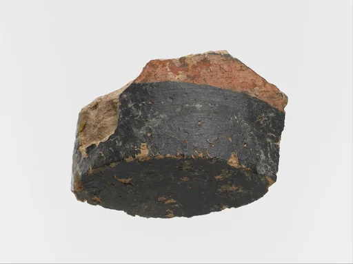 Terracotta fragment of the bottom of a cup with polychrome decoration